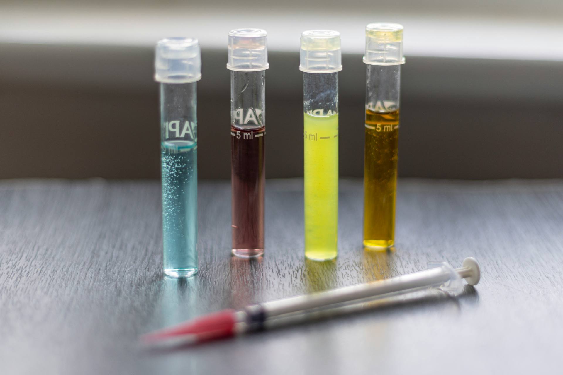 Coded chemical samples prepared for laboratory analysis