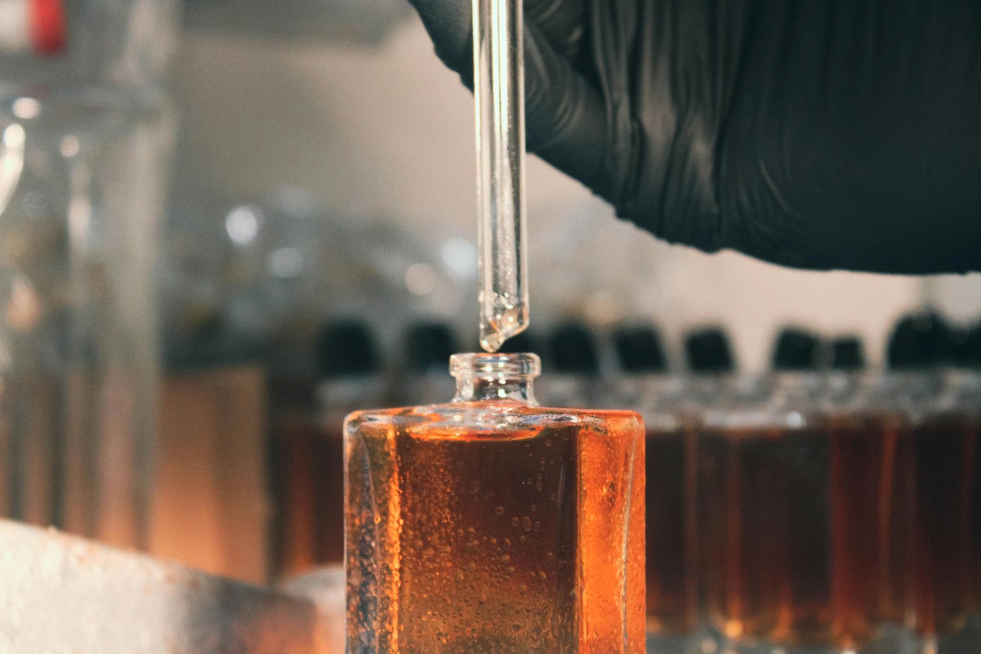 Laboratory pipette dispensing liquid during complex mixture analysis