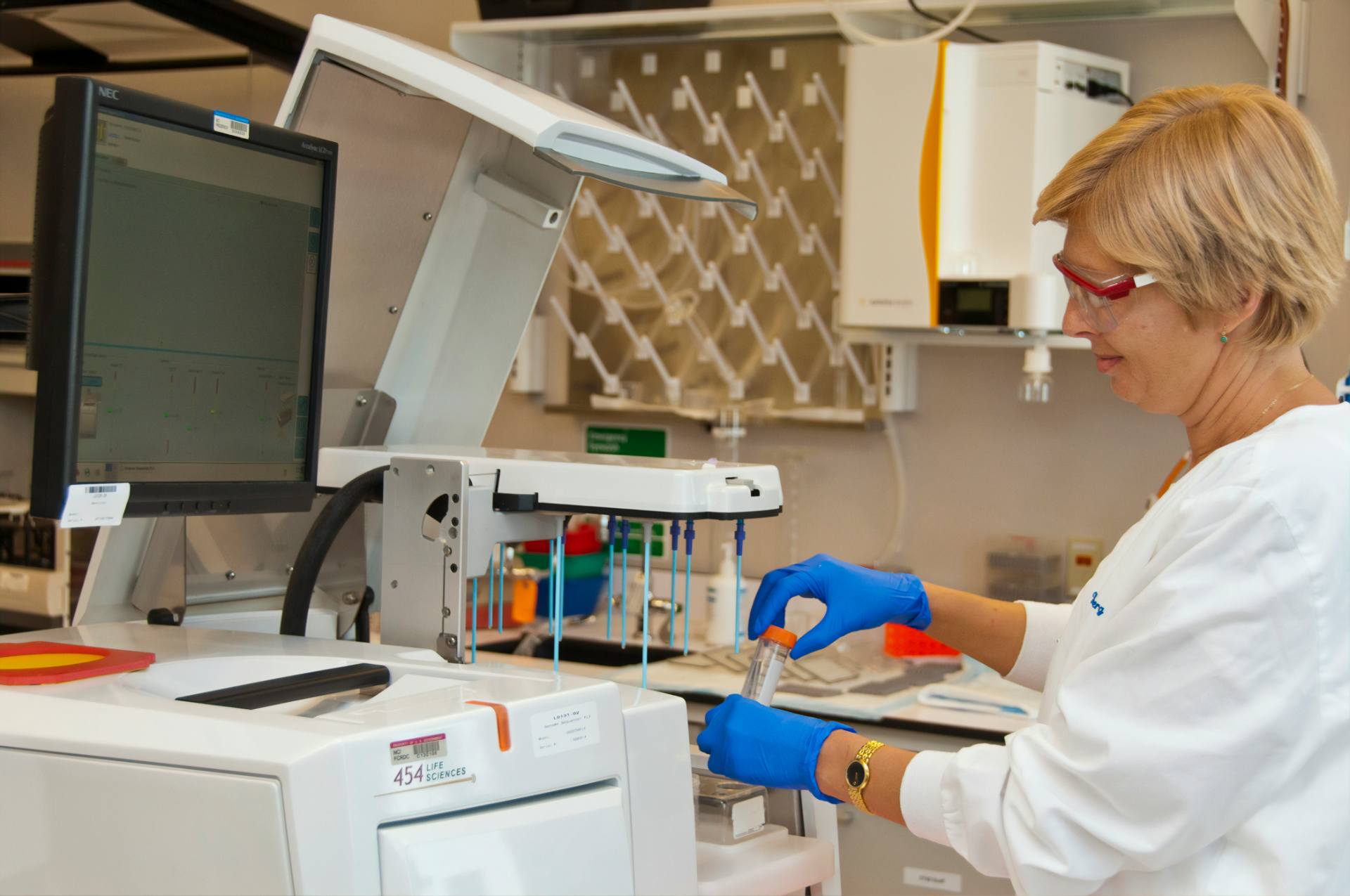 Scientist handling laboratory samples for UK and EU chemical compliance