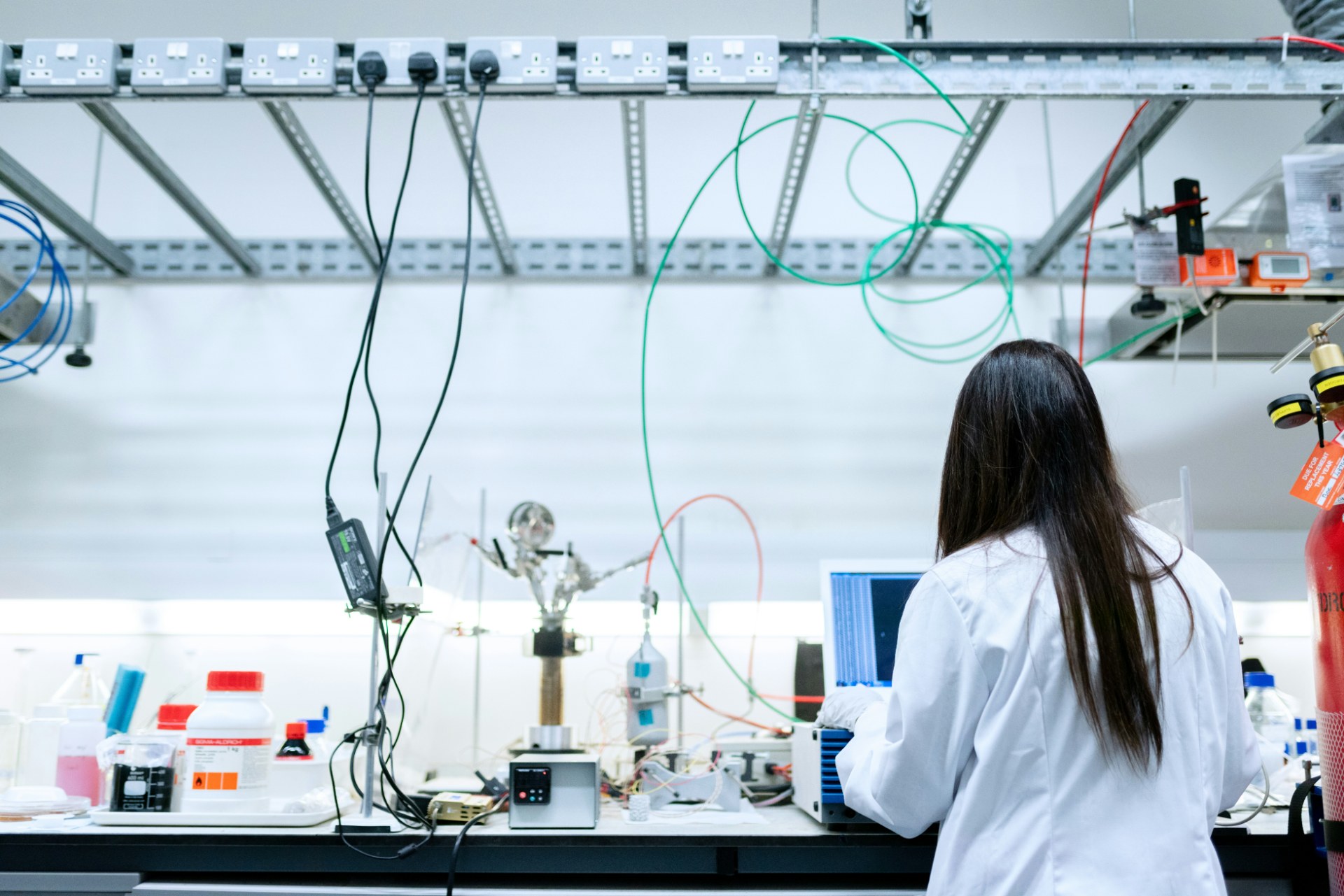 Chemical scientist working at an analytical laboratory bench