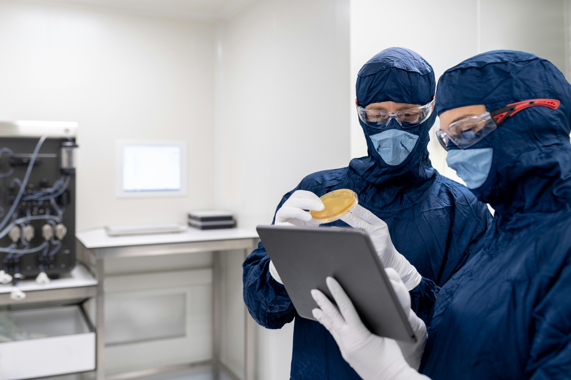 Laboratory specialists reviewing chemical testing results
